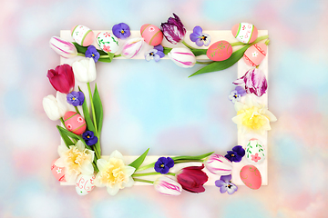 Image showing Colorful Easter Background with Decorated Eggs and Flowers