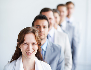 Image showing Woman, portrait and leader for team finance career, standing and ready for job interview. Worker, corporate accountant in suit or professional in workplace, colleagues in office and confident