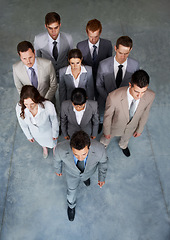 Image showing Top view, team of business people and leadership of man walking in office, staff cooperation or collaboration. Above, serious group and professional corporate employees, lawyers together and support