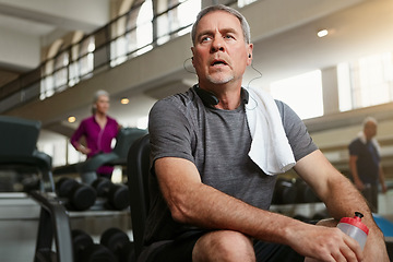 Image showing Fitness, break and tired senior man at a gym with water after training, exercise or challenge. Sports, fatigue and elderly male person with liquid for hydration, recovery or resting from workout