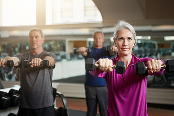 Image showing Fitness, training and senior people with dumbbells at gym for club exercise, wellness or cardio, health or strength. Class, workout or elderly friends at sports studio for bodybuilding weightlifting