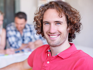 Image showing Portrait, happy business man and creative professional, young entrepreneur or businessman. Face smile, designer and employee at desk working at startup job, career and coworking at company or office