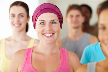 Image showing Portrait, fitness or smile and woman with a group of people in a studio for health, wellness or mindfulness. Exercise, workout and pilates with happy young friends in gym class for team training