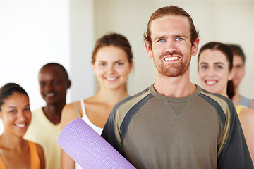 Image showing Portrait, yoga mat or class and man with a group of people in a fitness studio for health, wellness or mindfulness. Workout, training or pilates with happy young friends in gym for holistic exercise