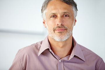 Image showing Smile, portrait and mature businessman in the office with positive, good and confident attitude. Happy, career and face of professional male lawyer from Mexico with legal career in modern workplace.