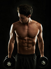 Image showing Topless, black background or bodybuilder in dumbbell workout, strength training or exercise in studio. Fitness model, dark or ripped man with healthy body, weights or biceps muscle for lifting power