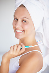 Image showing Woman, brushing teeth and portrait for clean hygiene in bathroom for healthy mouth, gum dental or wellness. Female person, toothbrush and whitening routine or orthodontics, oral glow or gingivitis