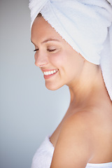 Image showing Profile of happy woman, natural beauty or towel for wellness in house bathroom for glow or detox. Morning, relax or confident model with skincare results, self care or healthy skin for dermatology