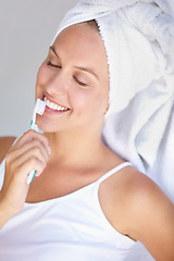 Image showing Woman, brushing teeth and smile for healthy care in bathroom for hygiene mouth, dental gum or wellness. Female person, toothbrush and whitening routine for orthodontics, oral glow or gingivitis shine