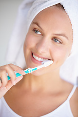 Image showing Woman, toothbrush and smile for clean hygiene in bathroom for healthy mouth, gum dental care or wellness. Female person, brushing teeth and whitening routine for orthodontics, oral glow or gingivitis