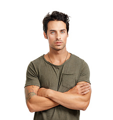 Image showing Serious, crossed arms and portrait of man in studio with casual, stylish and trendy outfit for confidence. Handsome, young and male person with cool style and positive attitude by white background.