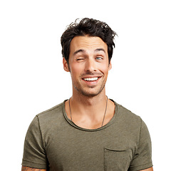 Image showing Face, smile and playful wink with a man in studio isolated on a white background for comedy or humor. Comic, funny and happy with a goofy young person acting silly as a character for a carefree joke