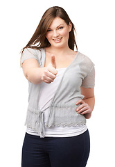 Image showing Smile, portrait and plus size model with thumbs up, confidence and casual fashion on white background. Self love, body positivity and happy woman with agreement, thanks or yes hand gesture in studio.