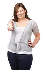 Image showing Yes, portrait and plus size model with thumbs up, smile and casual fashion on white background. Support, body positivity and happy woman with agreement, thank you or pride hand gesture in studio.