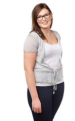 Image showing Casual fashion, portrait and plus size model with smile, glasses and isolated on white background. Self love, body positivity and happy woman with natural beauty, wellness and inclusion in studio.