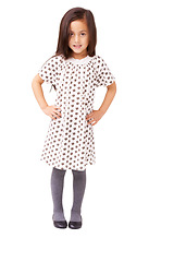 Image showing Studio, child or portrait with smile or fashion on white background with confidence or growth. Hands on hips, cute female kid or full body of young girl in Italy with dress, pride or clothes in style