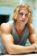 Image showing Portrait, natural beauty and man with fitness, muscular and confident guy with bodybuilder, blonde hair and strong. Face, person and athlete with tshirt, exercise and healthy with wellness or workout