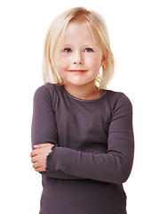 Image showing Happy, smile and child with crossed arms on a white background with style, joy or positive facial expression. Childhood, youth and isolated young girl with fashion, clothes or trendy outfit in studio