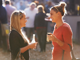 Image showing Women, beer outdoor or music festival in park or nature for celebration, discussion or group connection. Friends, event or smile for drinking alcohol beverages for summer, travel or holiday vacation
