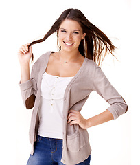 Image showing Twirling, hair and portrait of woman with fashion for casual style in white background or studio. Happy, person and girl relax with confidence, pride and smile in mockup space or haircut from salon