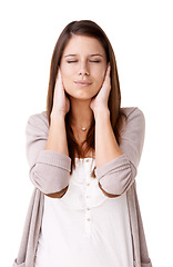 Image showing Stress, anxiety and woman with hands on face in studio for noise, tinnitus or headache on white background. Vertigo, hearing loss or model with panic attack, trauma or sensitive ears sensory overload
