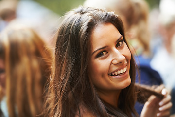 Image showing Happy, outdoor festival portrait and woman having fun, happiness and smile at Portugal social gathering. Music concert freedom, face headshot and Europe vacation person, entertainment or rave event