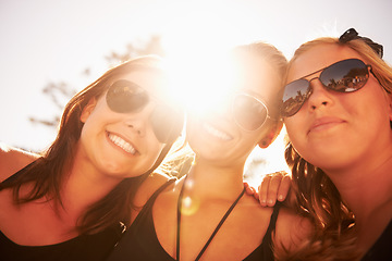 Image showing Woman, friends and outdoor sun at music festival for summer holiday, celebration or party concert. Female person, happy and nature for community carnival or excited group, event or social gathering