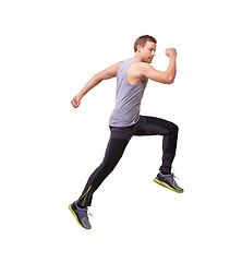Image showing Man, running and jump in fitness, workout and training in studio with wellness and energy or speed. Sports model, sprinter or runner in air, exercise and cardio or muscle health on a white background