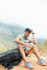 Image showing Portrait, hiking and happy with man in nature for health, trekking and adventure. Travel, explore and journey with person and water in mountain path for backpacking, relax and wellness vacation