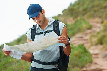 Image showing Man, hiking and map for guidance, nature and direction on trail, fitness and exercise on holiday. Male person, lost and documents for information, travel and journey or adventure to forest for cardio