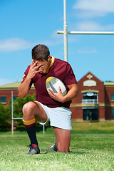 Image showing Upset, sad and rugby player with a ball for competition loss for training and match. Fit, athlete and sports man with field for mistake or fail in an active lifestyle looking frustrated in a uniform