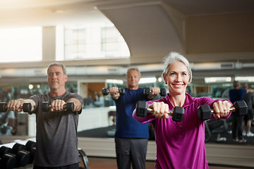 Image showing Training, fitness or senior people with dumbbells at gym for club exercise, wellness or cardio, health or strength. Class, workout or elderly friends at sport studio for bodybuilding or weightlifting