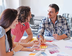 Image showing Teamwork, creative and business people brainstorming at table in meeting, cooperation and collaboration in office startup. Happy group, designer and color swatches, planning together and discussion