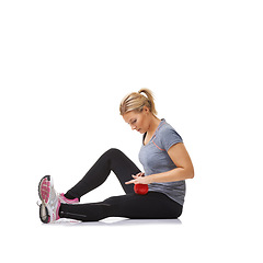 Image showing Woman, massage ball and healing body or physical therapy, injury and health or wellness by white background. Female person, athlete and studio or rehabilitation for muscles in legs and body in mockup