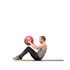 Image showing Man, medicine ball and sit up for training workout in studio on white background for mockup space, healthy or strength. Male person, sports equipment and exercise mat, target muscle abs or wellness