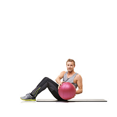 Image showing Man, portrait and medicine ball for training workout in studio on white background for mockup, healthy or strong. Male person, face and sports equipment or exercise mat, target muscle abs or wellness