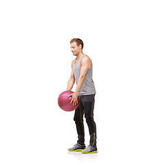 Image showing Man, medicine ball and gym training in studio for workout exercise, balance goal or white background. Male person, sports equipment and muscle fitness or mockup space for healthy, cardio or strong