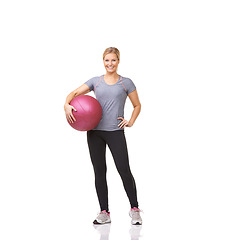 Image showing Woman, portrait and medicine ball in studio or exercise workout, gym pilates or white background. Female person, face and equipment as balance fitness or mockup space for cardio, wellbeing or athlete