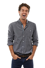 Image showing Entrepreneur, laughing and confident man in studio, white background and professional style. Businessman, smile and hands in jeans, pockets and funny person with fashion o worker with happiness