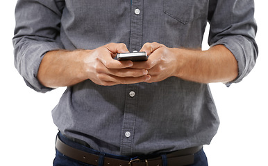 Image showing Business man, hands and typing on smartphone in studio for mobile chat, social network or notification on white background. Closeup, worker and scroll on cellphone, news app or search digital contact