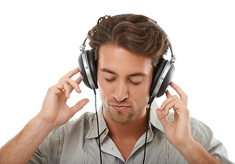 Image showing Headphones, calm man or music in studio for audio subscription, streaming multimedia or digital radio on white background. Face of model listening to peaceful podcast, hearing sound or relax for song