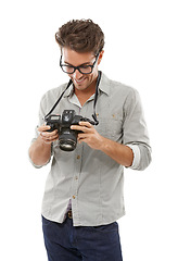 Image showing Photographer man, camera and thinking in studio with smile for journalist job by white background. Reporter person, newspaper employee and happy for media, paparazzi or check picture for news story