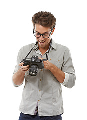 Image showing Man, photographer and happy for camera creative or picture result, capture hobby or studio white background. Male person, excited and digital equipment with lens for skill career, mockup space or job