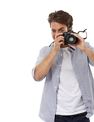 Image showing Photographer man, camera and click in studio with vision for shooting job by white background. Reporter person, newspaper employee and journalist for media, paparazzi and photoshoot for news story