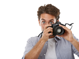 Image showing Photographer man, camera and click in studio with portrait, shooting or mockup space by white background. Reporter person, newspaper employee or journalist in media, paparazzi or photoshoot for story