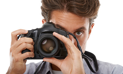 Image showing Man, portrait and camera as photographer in studio for creative vision, capture hobby or white background. Male person, face and digital equipment for picture art on mockup space, shooting or skill