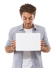 Image showing Mockup, sign and man on poster, advertising and space isolated on a white studio background. Face, paper and person show banner for promotion, information or blank billboard presentation on placard