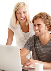 Image showing Laptop, smile and ecommerce with a young couple in their apartment for accounting or budget planning together. Computer, bank or finance with a happy man and woman in their home for investment growth