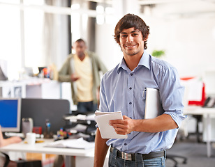 Image showing Businessman, portrait and happy with tablet in office, technology and career pride for startup. Entrepreneur, smile and face with touchscreen with job ambition, creative and relax wellness in company