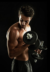 Image showing Topless, black background or man in dumbbell workout, training or exercise in studio for power. Fitness model, dark or ripped person with healthy body, shadow or biceps muscle for wellness or lifting